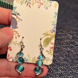 Silver tone and blue dot earrings